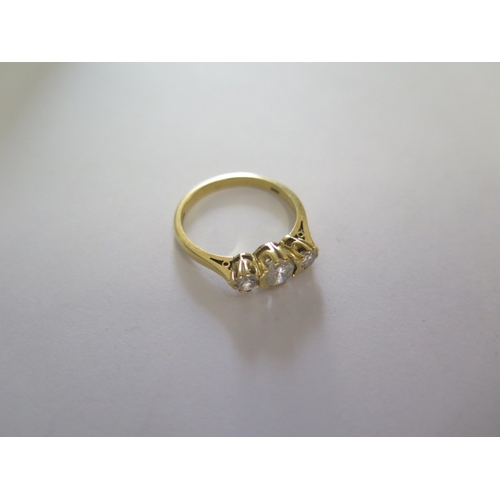 143 - An 18ct yellow gold three stone diamond ring size Q - approx weight 3.7 grams - good condition, diam... 