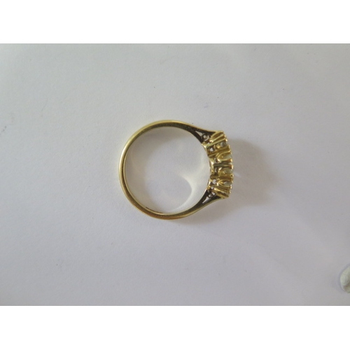 143 - An 18ct yellow gold three stone diamond ring size Q - approx weight 3.7 grams - good condition, diam... 