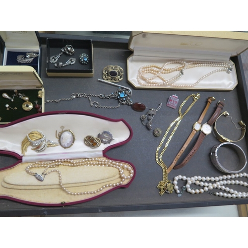 149 - A collection of assorted costume jewellery and watches including a silver bangle