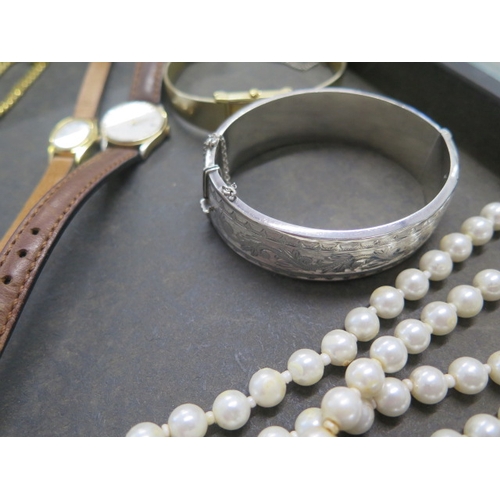 149 - A collection of assorted costume jewellery and watches including a silver bangle