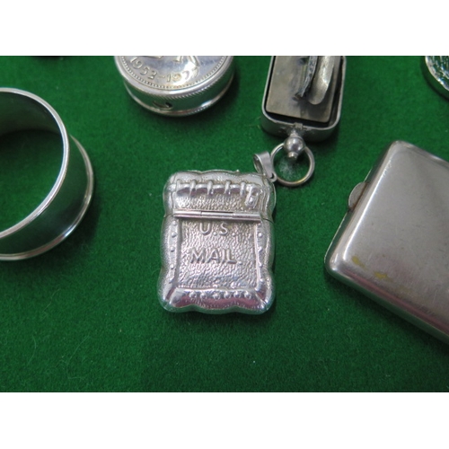 153 - A silver napkin ring, a one ounce silver ingot, a 925 ring and stamp case and coin case and four bas... 