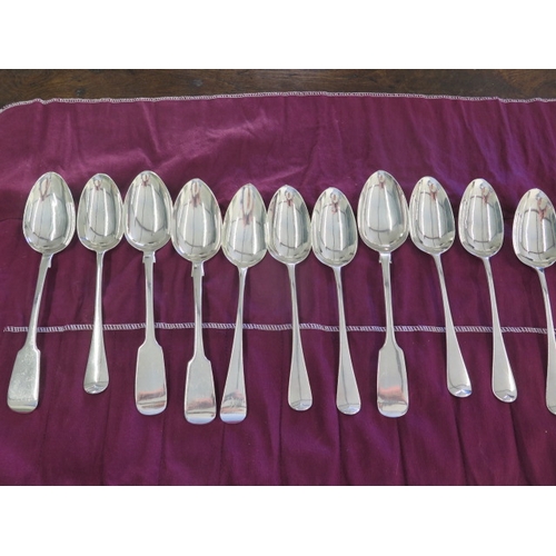 161 - A collection of 11 silver table spoons - Largest 23cm - assorted makers and years - total weight app... 