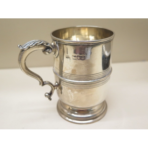 167 - Two silver tankards tallest 10cm by Mappin and Webb, smallest is engraved - total weight approx 8.4 ... 