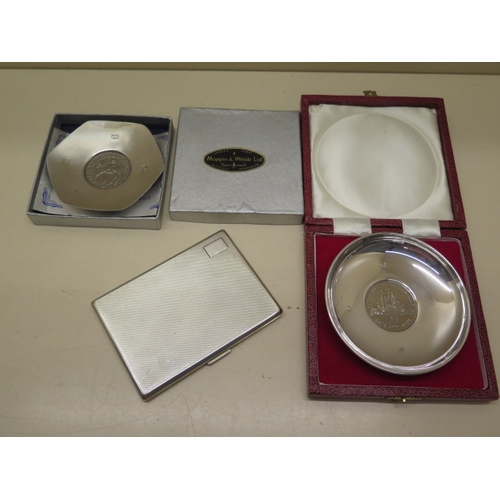 169 - A boxed silver Mappin and Webb Jubilee coin dish Birmingham 1977, a boxed coin dish London 1976 and ... 