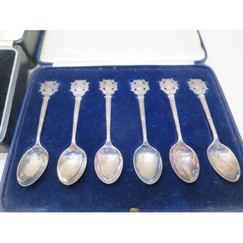 181 - A boxed silver Christening set - no engraving - a boxed set of silver handle knives, a boxed set of ... 