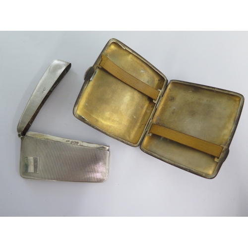 183 - A silver cigarette case and a silver card case - approx weight 3.94 troy oz