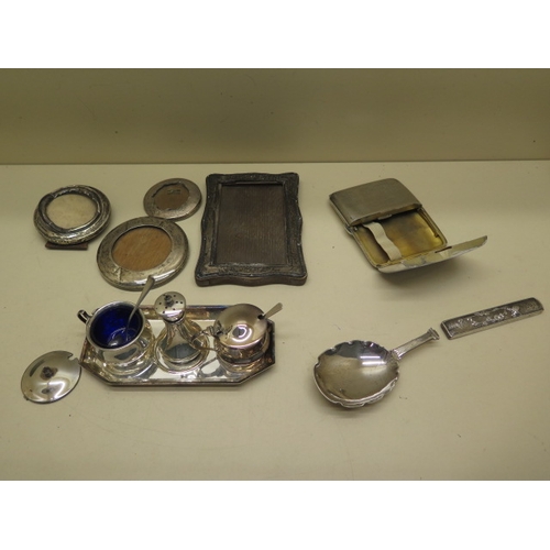 187 - A Victorian silver broken spoon London 1883/84 - Length 20cm - a silver cigarette case, a silver cru... 