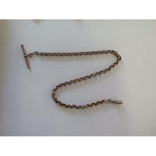 20 - A 9ct yellow gold watch chain - Length 36cm - weight approx 18.7 grams - some wear but catch good