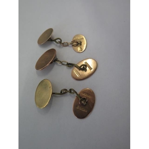 21 - A pair of 9ct yellow gold cufflinks and a single cufflink - approx weight 10 grams - some replacemen... 