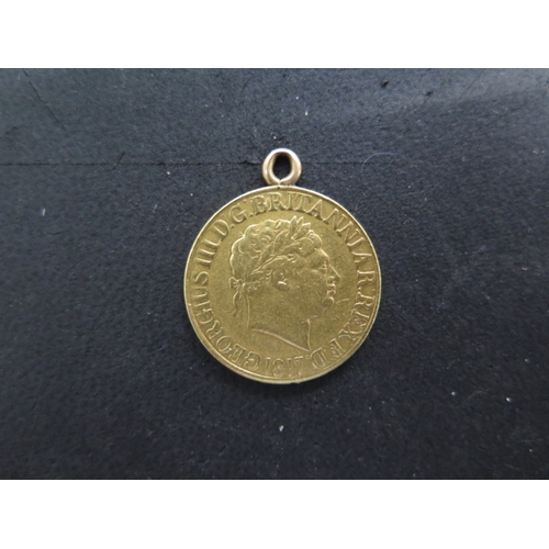 235 - A George III gold full sovereign dated 1817 with pendant loop