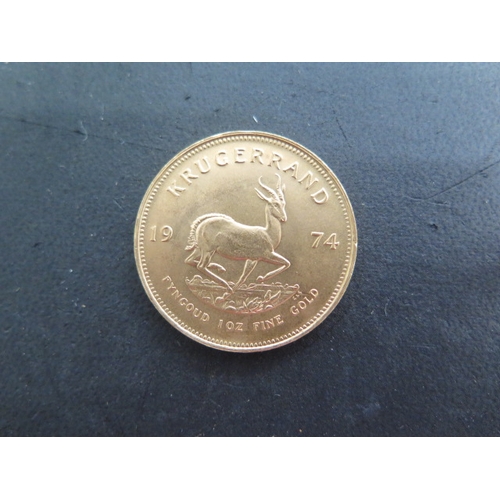 251 - A Fyngoud 1oz Fine Gold Krugerrand coin dated 1974