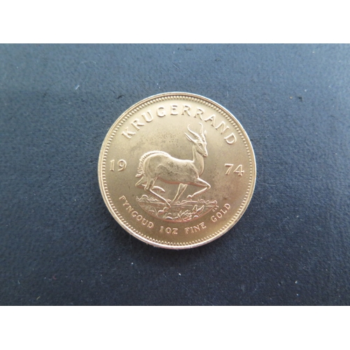 253 - A Fyngoud 1oz Fine Gold Krugerrand coin dated 1974