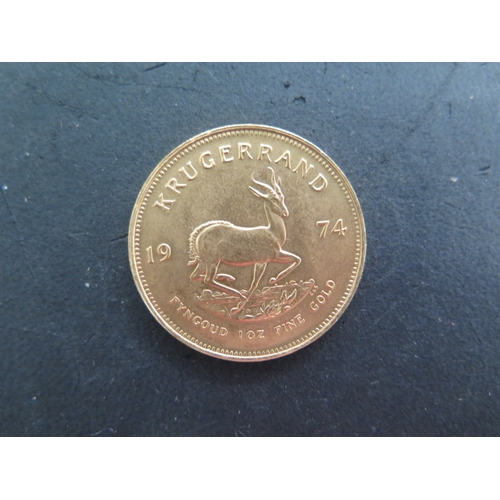 254 - A Fyngoud 1oz Fine Gold Krugerrand coin dated 1974