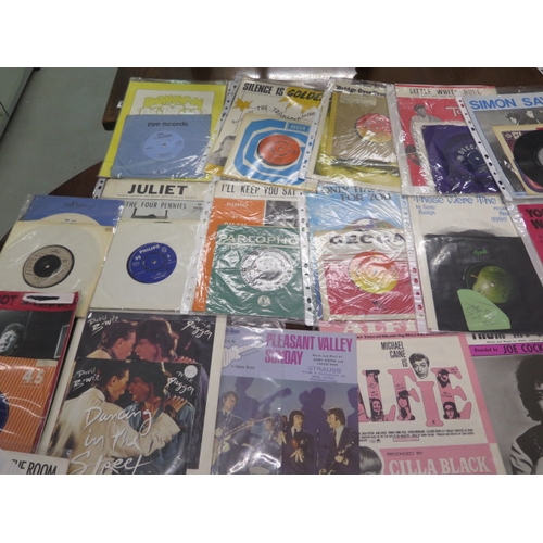 266 - A collection of 25 45rpm pop records with related magazines including Tom Jones, The Ivy League, Dav... 