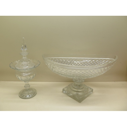 281 - A cut glass Navette shaped bowl on stand - Height 25cm x 43cm - some scratches and small chips mainl... 