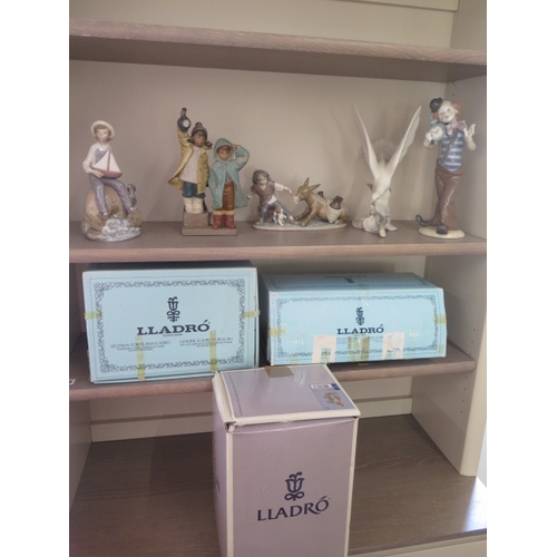 284 - Three Lladro groups - A Clown, boxed and a Bird, boxed - including Ahoy There, boxed and two other g... 