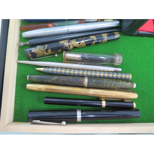 297 - A good collection of assorted inkpens and pencils including Parker, Cross, Sheaffer