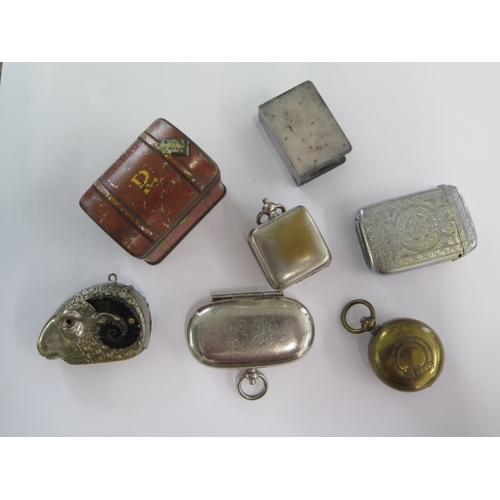 299 - Three base metal coin cases, a plated vesta, a Rams head vesta and a plated matchbox case and miniat... 