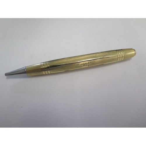 301 - A Mont Blanc gilt plated pencil - Length 11cm - mechanism seems seized, some wear to plate