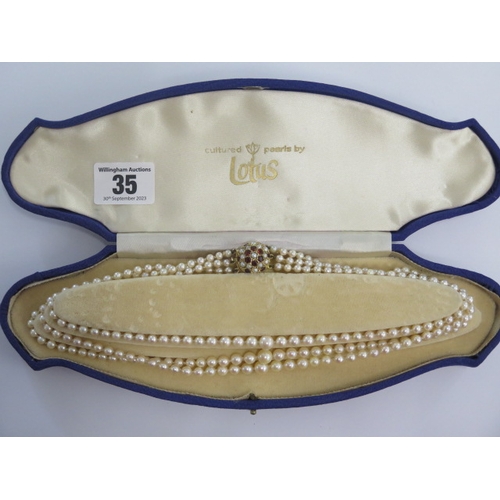 35 - A triple string of Lotus cultured pearls with a 375 9ct clasp - Length 43cm - largest pearl approx 7... 