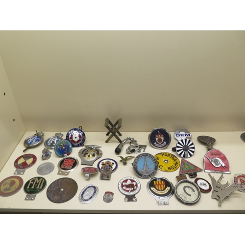 370 - A collection of 30 motoring/car badges and attachments