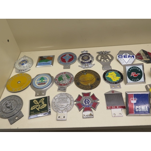 372 - A collection of 30 motoring/car badges