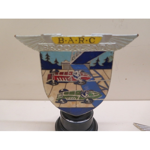 379 - A Brooklands Automobile Racing Club enamel car badge on stand by Spencer London number 868 - some ch... 