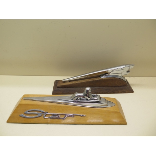 380 - An Armstrong Siddley Sphinx car mascot on a wooden base with STAR plaque - Length 39cm - and a Peuge... 