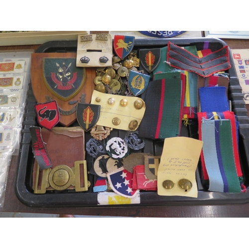 407 - A collection of assorted Militaria including badges, buttons, cigarette cards etc