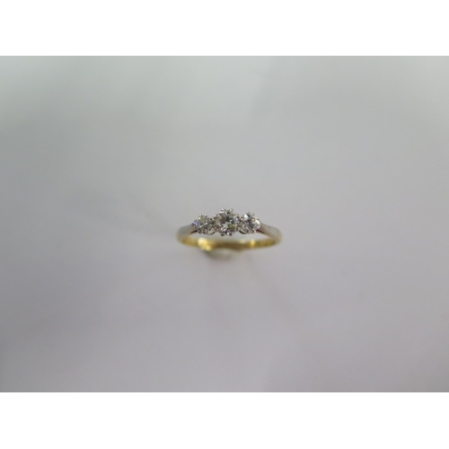 41 - An 18ct yellow gold and platinum three stone diamond ring size K/L - approx weight 1.8 grams - diamo... 