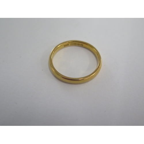 43 - A 22ct yellow gold hallmarked band ring size L - approx weight 3.1 grams