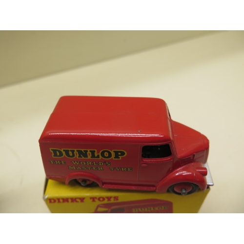 447 - A boxed Dinky Dunlop Trojan van in good condition, minor blemishes, a tinplate AA box and a clockwor... 