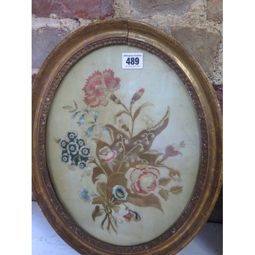 489 - Two 19th century needlework designs in oval gilt frames - Largest 42cm x 33cm