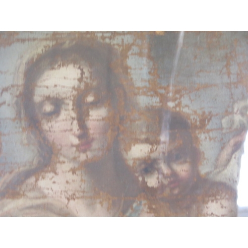 490 - An oil on canvas of Madonna and Child - in poor condition, has been framed under glass - frame size ... 