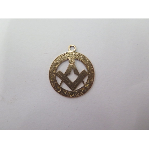 52 - A hallmarked 9ct yellow gold Masonic fob - Width 20mm - approx weight 2 grams