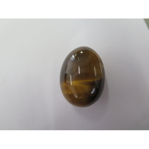 53 - A Tigers Eye stone egg - 33mm tall - traditionally Tigers Eye was to ward off evil