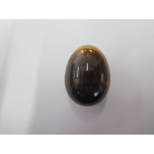 53 - A Tigers Eye stone egg - 33mm tall - traditionally Tigers Eye was to ward off evil