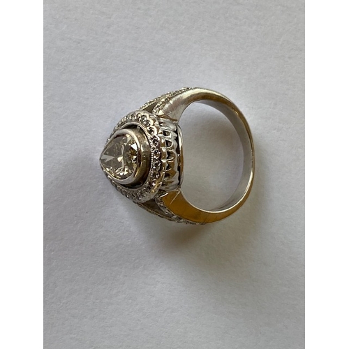 55 - An impressive pear cut 18ct white gold diamond ring - the natural pear cut diamond measures approx 1... 