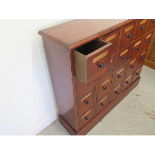 557 - A mahogany twenty drawer apothecary/chemist/alchemy chest - made by a local craftsman to a high stan... 