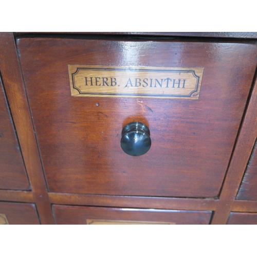 557 - A mahogany twenty drawer apothecary/chemist/alchemy chest - made by a local craftsman to a high stan... 