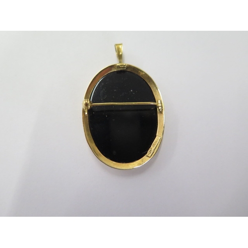 57 - An 18ct yellow gold Cameo pendant/brooch - 39mm x 24mm - in good condition - approx weight 5 grams -... 