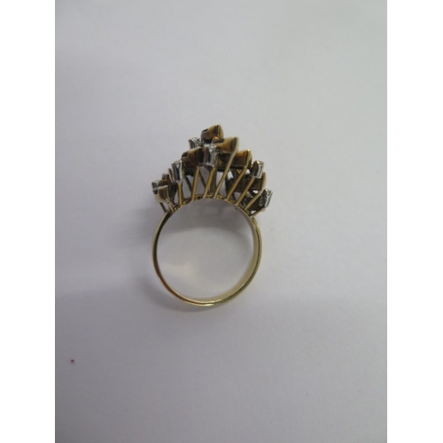58 - An 18ct yellow gold geometric cluster dress/cocktail ring - size P - approx weight 6 grams - in good... 