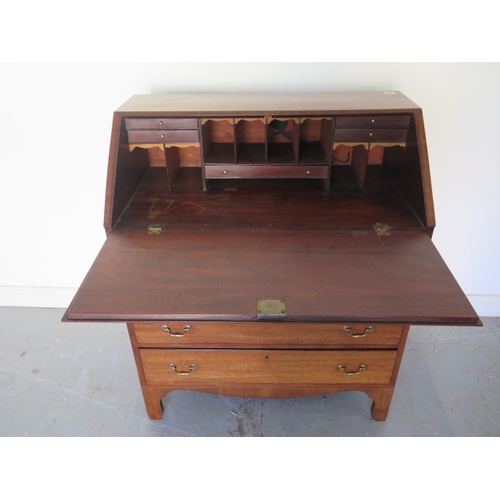 586 - A 19th century mahogany four drawer bureau with a fitted interior - Height 111cm x 92cm x 50cm