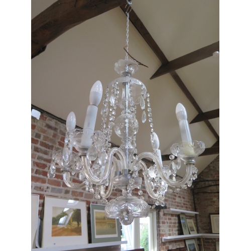 592 - A cut glass five branch chandelier - Height 67cm x Width 50cm