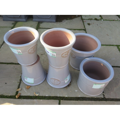 630 - Four JC & Co Garden Ware glazed sky blue planters - Height 20cm - and two other pots - RRP £74.94