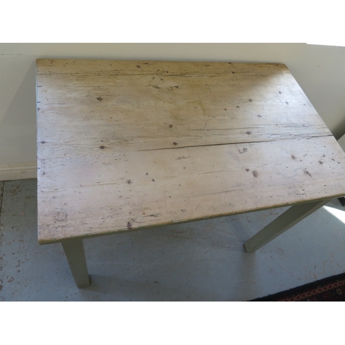 635 - A pine kitchen table with painted base - Height 77cm x 107cm x 68cm