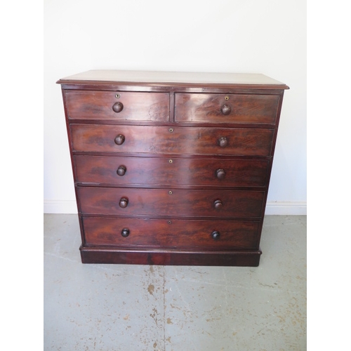 636 - An early Victorian flame mahogany chest of two over four graduated drawers on a plinth base - Height... 