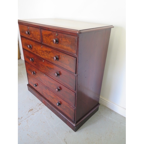 636 - An early Victorian flame mahogany chest of two over four graduated drawers on a plinth base - Height... 