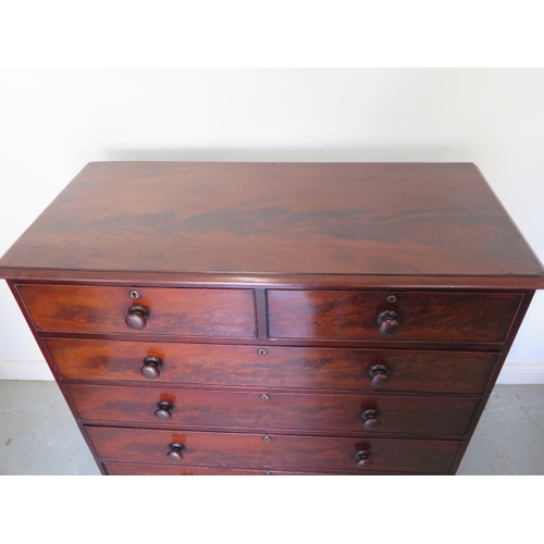 636 - An early Victorian flame mahogany chest of two over four graduated drawers on a plinth base - Height... 