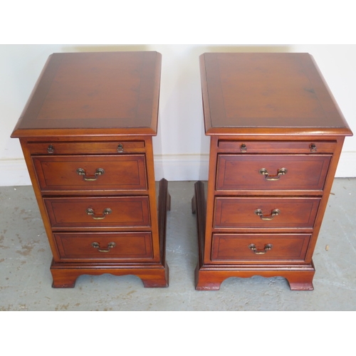 640 - A 20th century pair of reproduction yew wood bedside chests with brushing slides - 61cm x 36cm x 43c... 